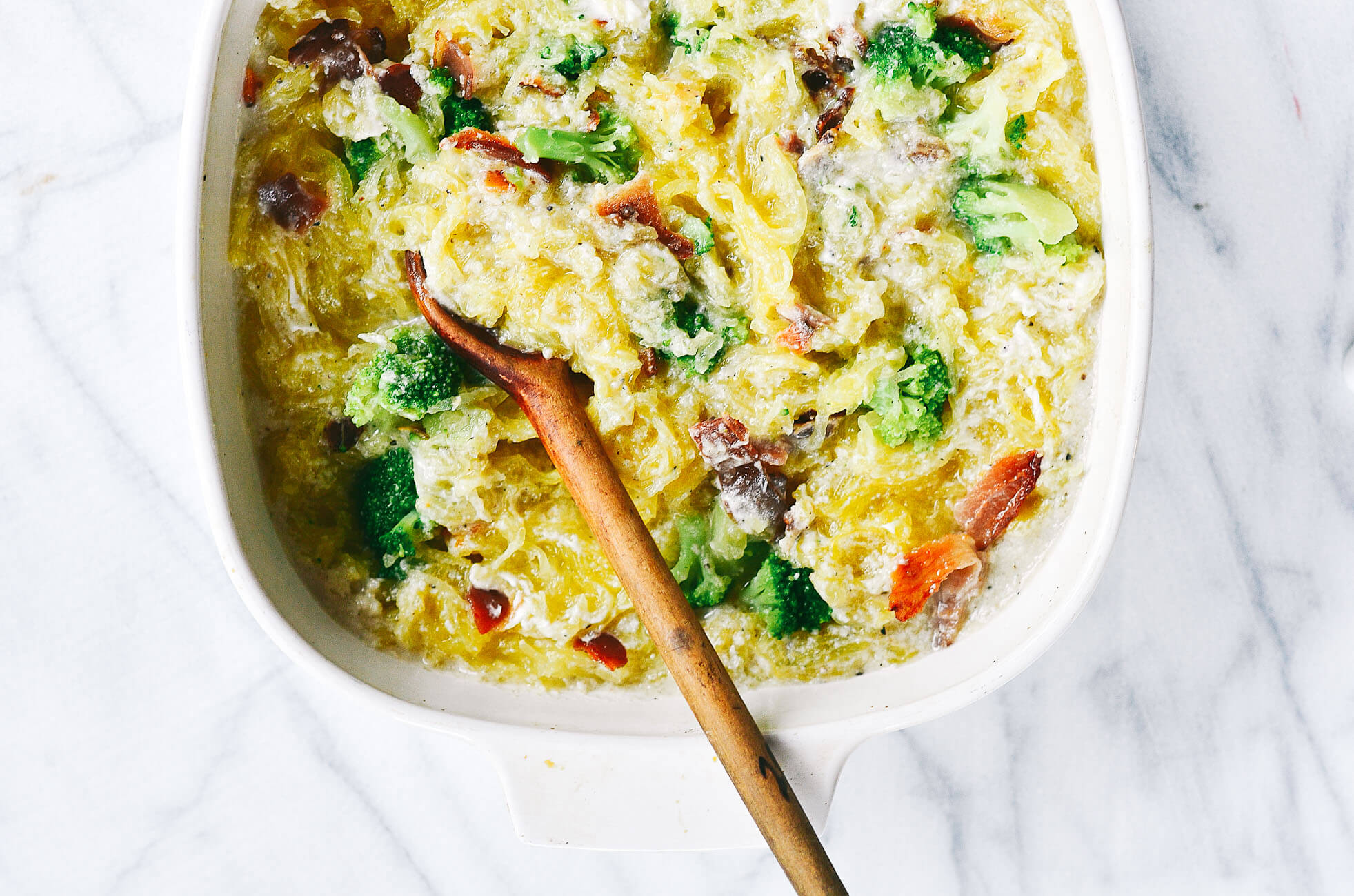 Easy whole30 creamy bacon garlic spaghetti squash bake. Paleo, healthy, and easy to make! Get ready to dig into some serious delicious and healthy eats!! How to cook spaghetti squash. Healthy spaghetti squash bake. Easy whole30 dinner recipes. Whole30 recipes. Whole30 lunch. Whole30 recipes just for you. Whole30 meal planning. Whole30 meal prep. Healthy paleo meals. Healthy Whole30 recipes. Easy Whole30 recipes.