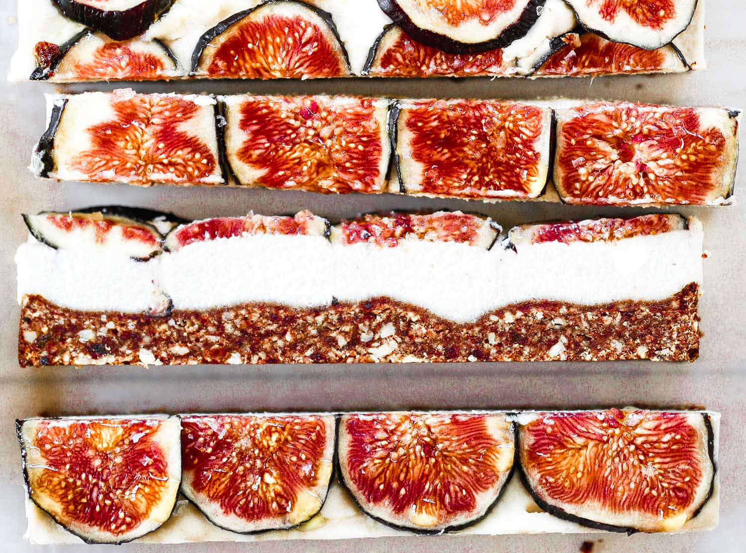 Easy vegan paleo fig and honey cheesecake with a delicious crisp “graham cracker” crust. Gluten free and so super easy to make! Freezer friendly, but not a necessity! dairy free cheesecake recipe. Raw paleo cheesecake recipe. No bake cashew cheesecake. Best gluten free vegan cheesecake. Raw paleo cheesecake recipe. No bake cheesecake recipe. Paleo cream cheese. Best paleo dessert recipes. Healthy paleo cheesecake fig cheesecake. .