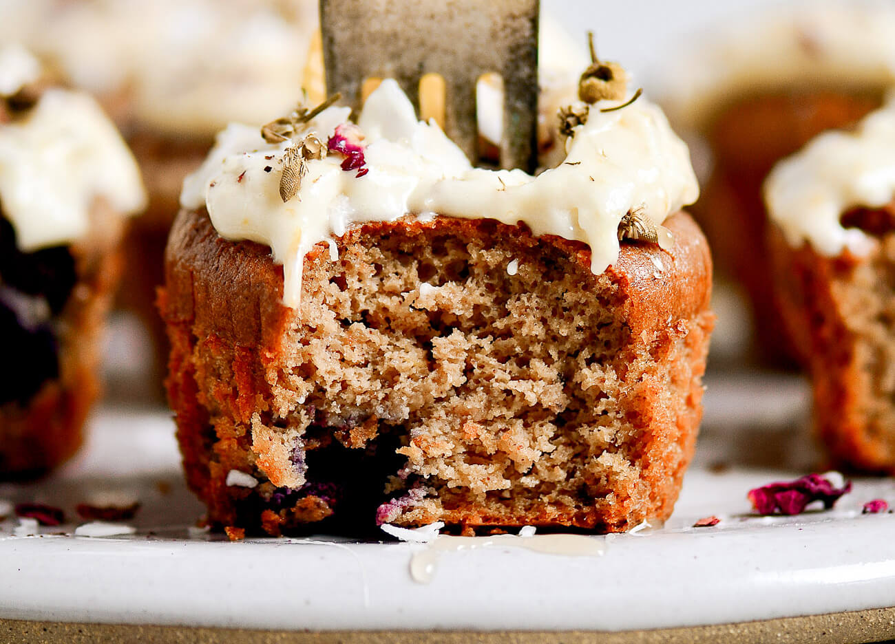 The lightest, most fluffy paleo blueberry muffins! Made with cashew butter and topped with a lushes vegan whipped lemon frosting. Naturally flourless, gluten free, dairy free, and dang delicious! Best gluten free breakfast recipes. Easy paleo diet recipes for beginners. Best gluten free diet desserts. Easy paleo muffins. Easy paleo gluten free blueberry muffins. Vegan lemon frosting recipe. Easy paleo cupcakes. Best gluten free blueberry muffins. Best paleo muffins. Best gluten free muffins. Easy gluten free muffin recipe.