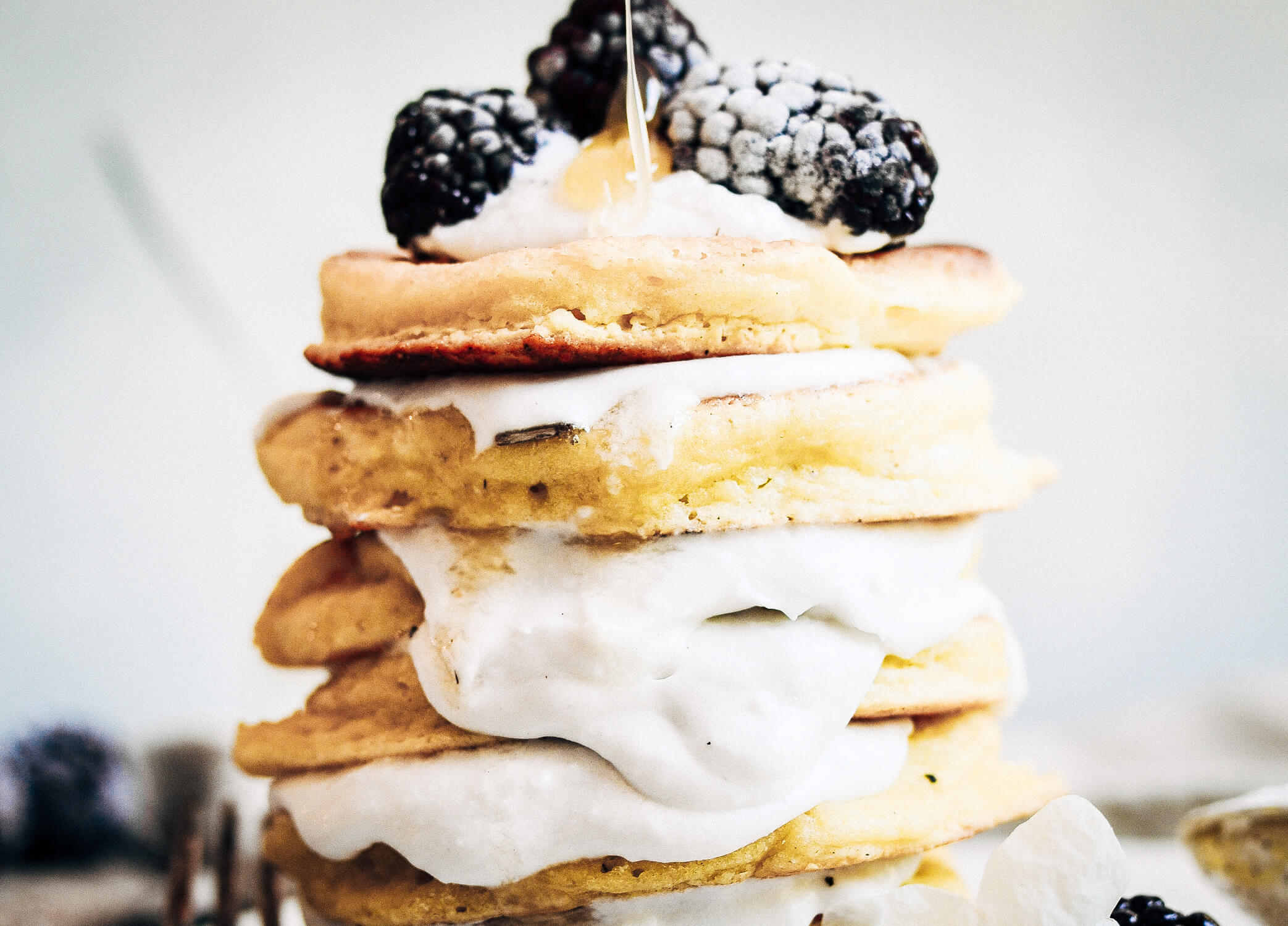 Easy healthy pancake recipe the whole family will love! Paleo pancakes that can be made ahead and stored in the freezer for quick and easy paleo breakfasts on the go. Recipe for light and fluffy homestyle grain free pancakes.