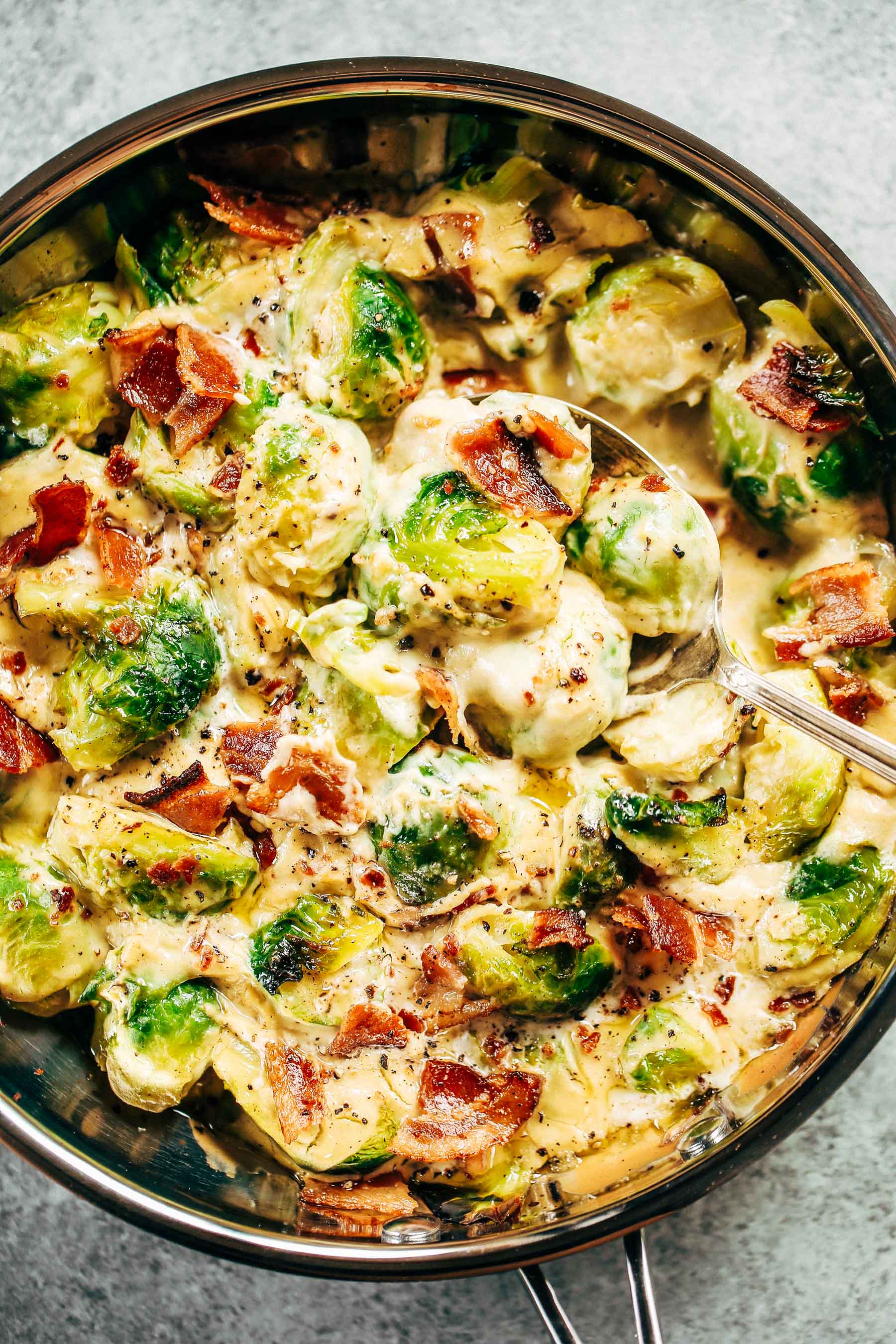 Creamy bacon brussel sprouts in cauliflower cream sauce! This dish is outstanding all on it’s own or can be paired with another side of greens. It’s a family favorite! Gluten free, dairy free, paleo, and whole30. Easy whole30 dinner recipes. Whole30 recipes. Whole30 lunch. Whole30 recipes just for you. Whole30 meal planning. Whole30 meal prep. Healthy paleo meals. Healthy Whole30 recipes. Easy Whole30 recipes.