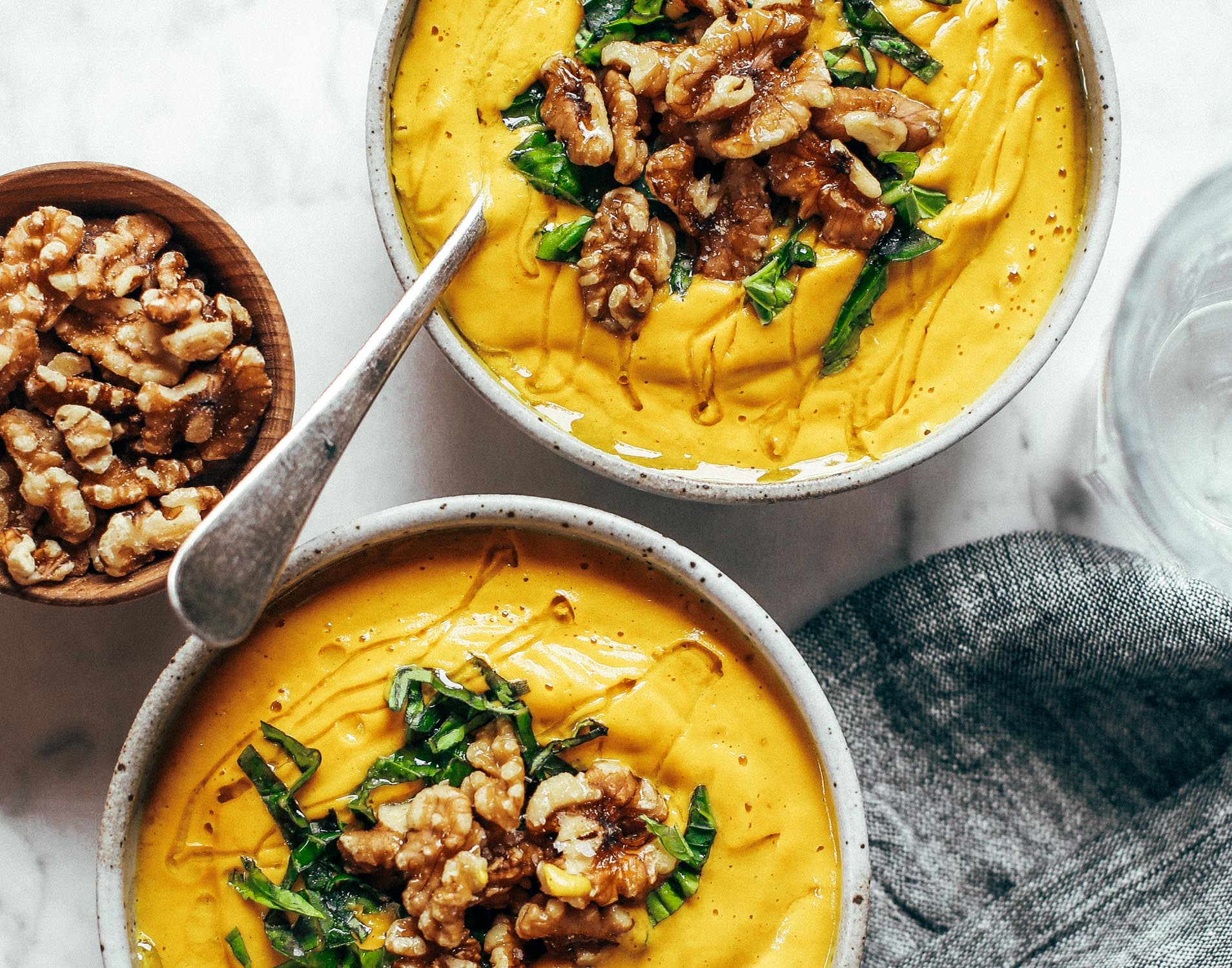 Creamy golden turmeric vegetable soup; made with vegetables, cashews, and curry spices! A warm and comforting paleo whole30 dinner recipe, full of rich earthy flavors. Whole30 easy recipes. Easy whole30 dinners. Whole30 trader joes recipes. Whole30 dinner meal planning. Easy whole30 soup. Paleo for beginners. Paleo diet recipes. Paleo dinner ideas.