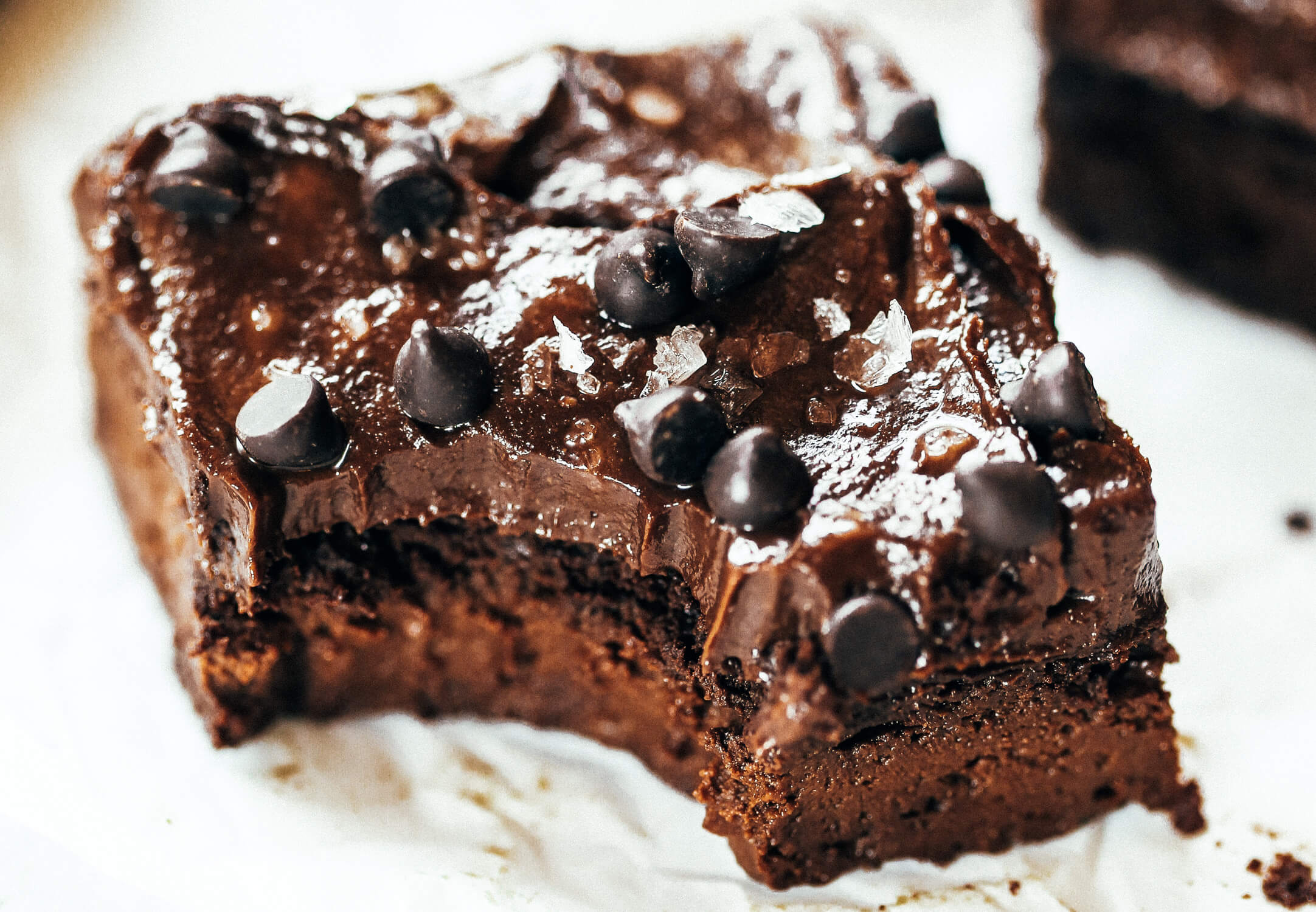 Best fudgy paleo brownies made with avocado and sweet potatoes! Easy flourless brownies with avocado buttercream frosting! Ultra-rich, veggie-packed, decadent, triple-chocolate, healthy brownies. Paleo for beginners. Paleo diet recipes. Paleo desserts. Easy paleo avocado desserts. Sugar free paleo desserts. Quick paleo desserts. Best paleo brownies.