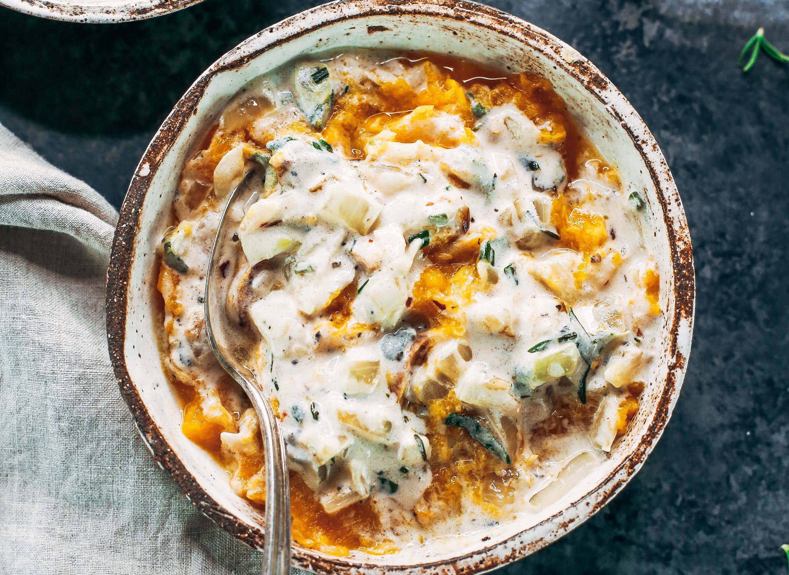 This savory whole30 breakfast bowl is made with butternut squash, chicken sausage, and sage cream sauce. Dairy free and paleo breakfast idea for busy families and individuals who are looking for a healthy breakfast packed with protein, nutrients, and flavor! #whole30 #paleo #healthybreakfast #chicken #paleodiet
